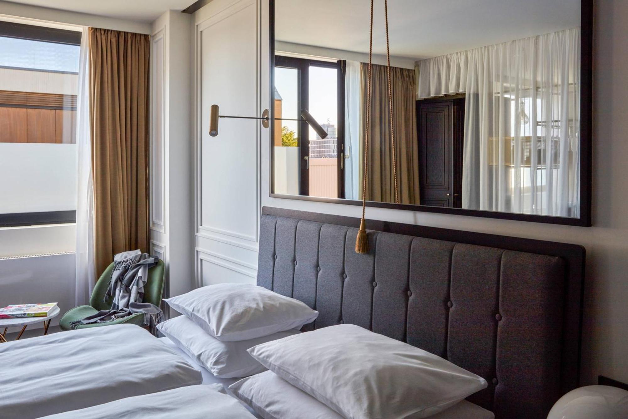 Roomers Munich, Autograph Collection Luaran gambar A room at the Hotel